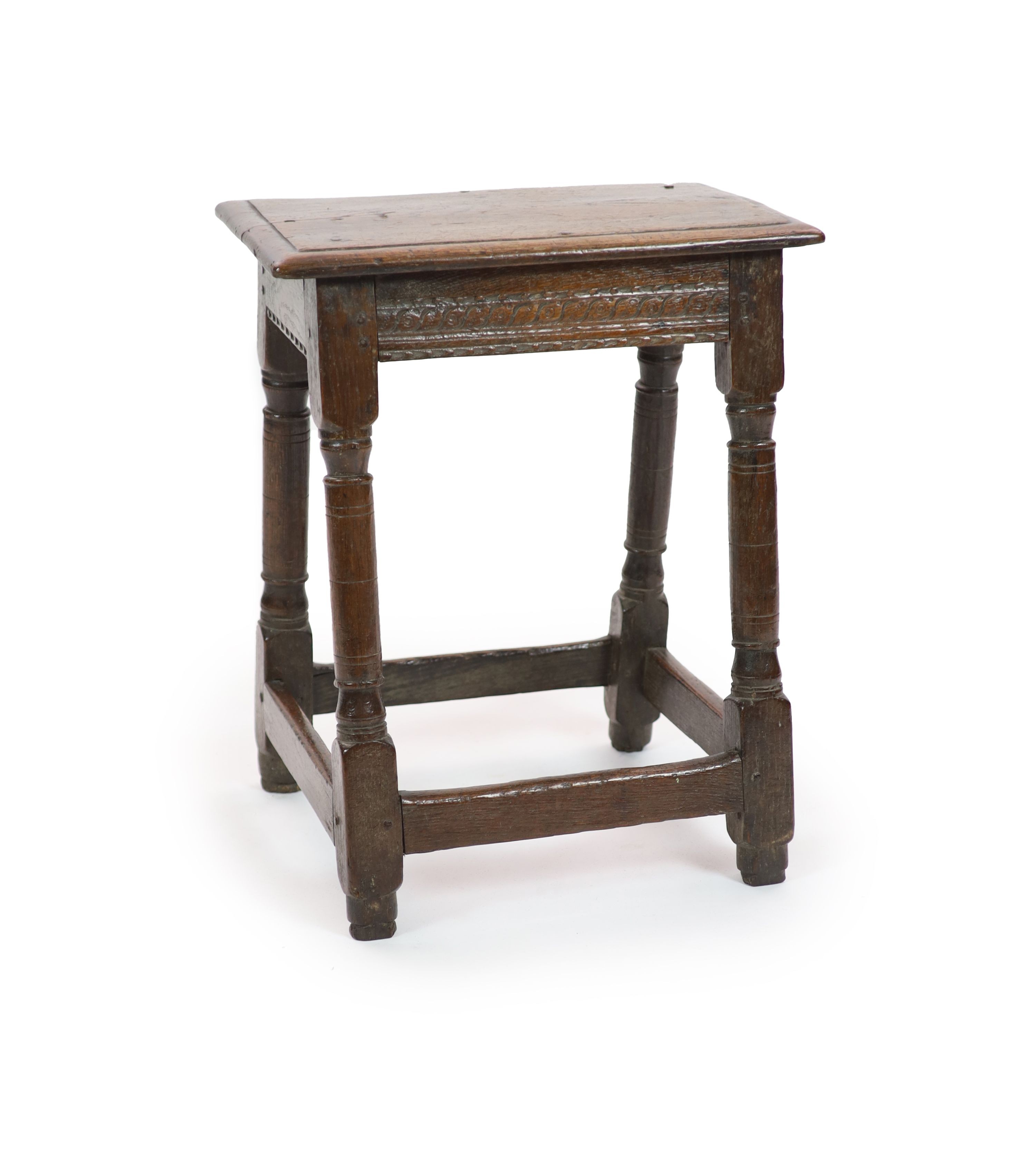 A mid-17th century oak joint stool H 58cm. W 48cm. D 30cm.